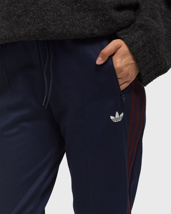 WMNS GRAPHIC CREST TRACKSUIT PANTS