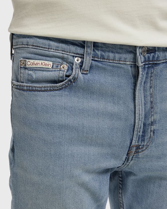 SLIM TAPER DISTRESSED SEA JEAN