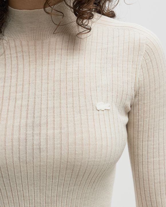 SWEATERS