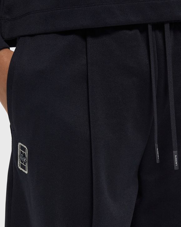 TRACK PANTS