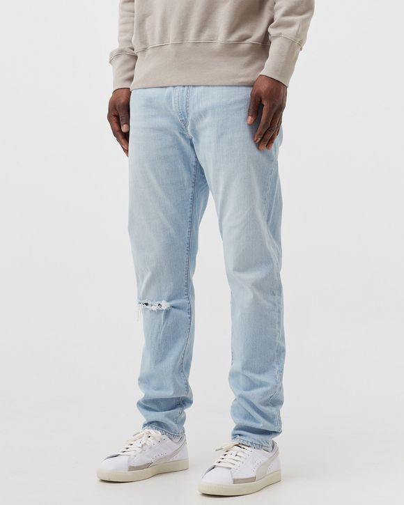 512 SLIM TAPER JEANS
