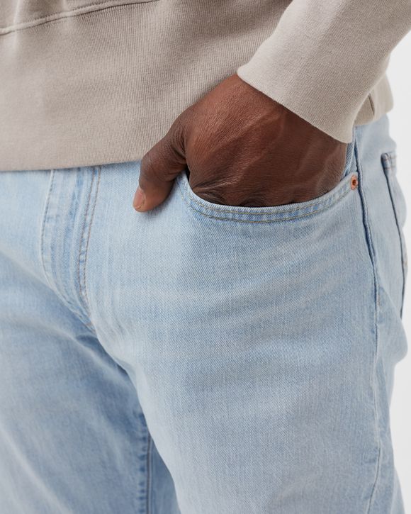 512 SLIM TAPER JEANS