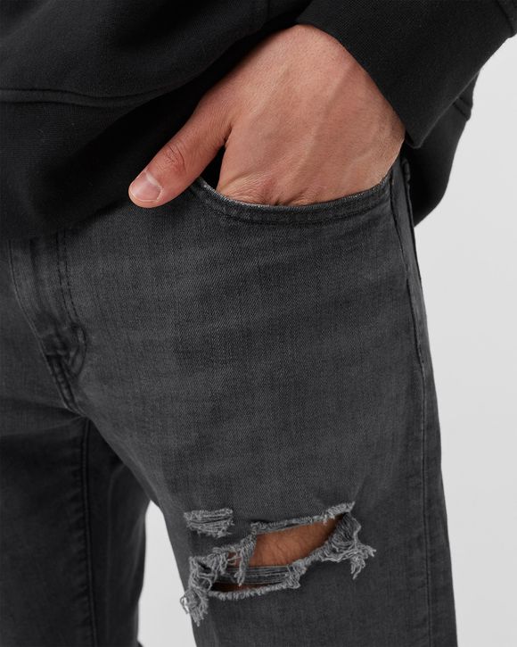 512 SLIM TAPER JEANS