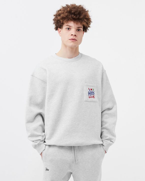Lucky Charm Pocket Crewneck Sweater