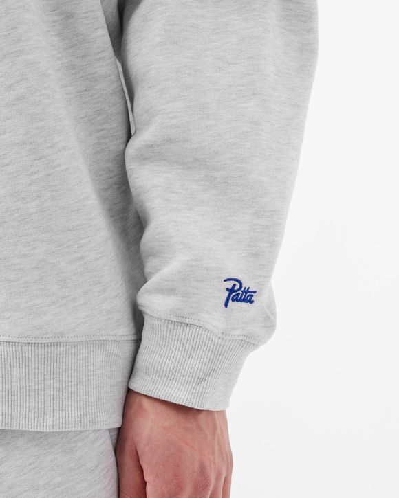 Lucky Charm Pocket Crewneck Sweater