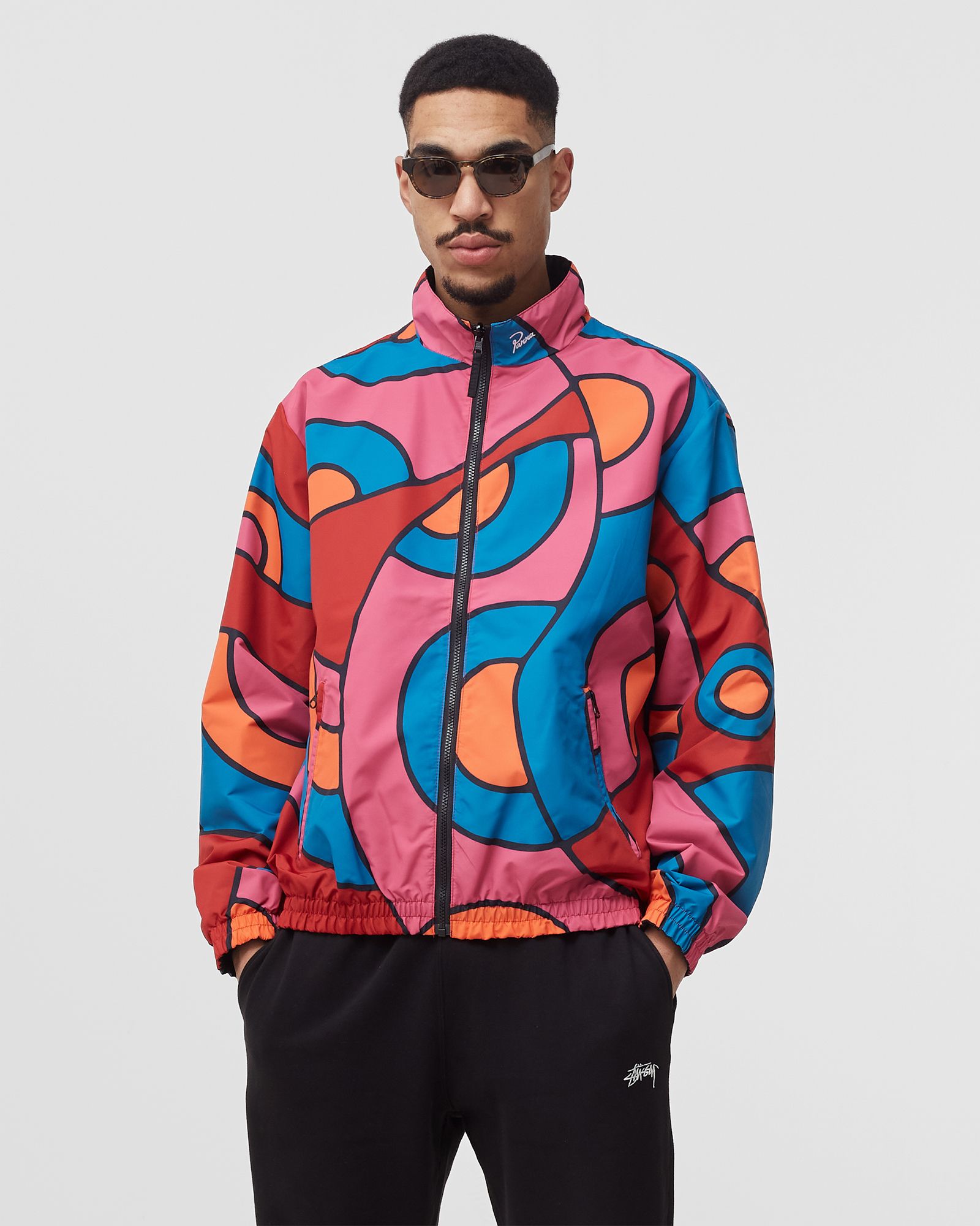 serpent pattern track top