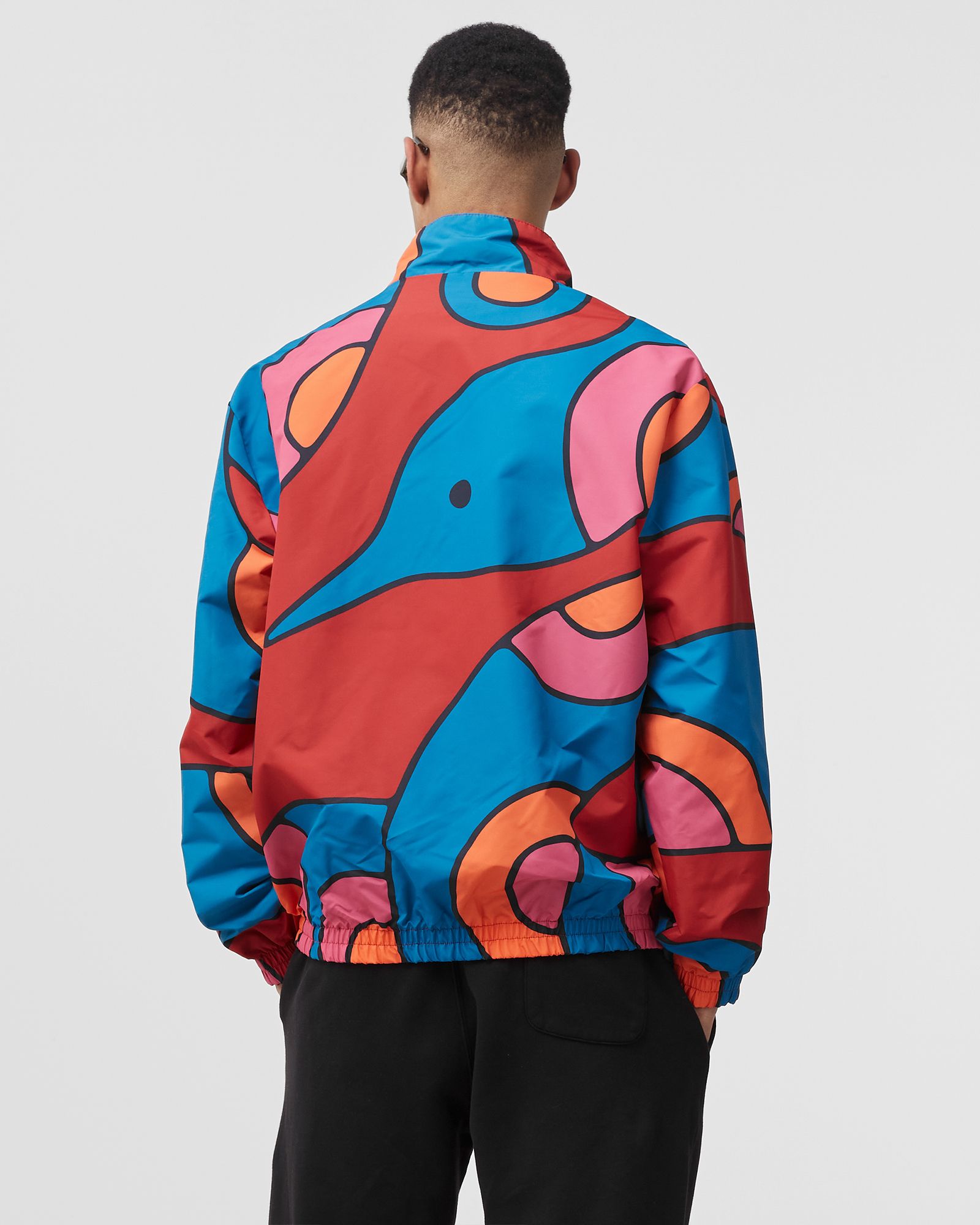 serpent pattern track top