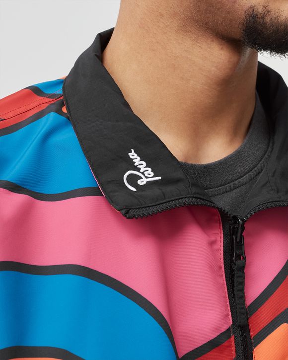 serpent pattern track top