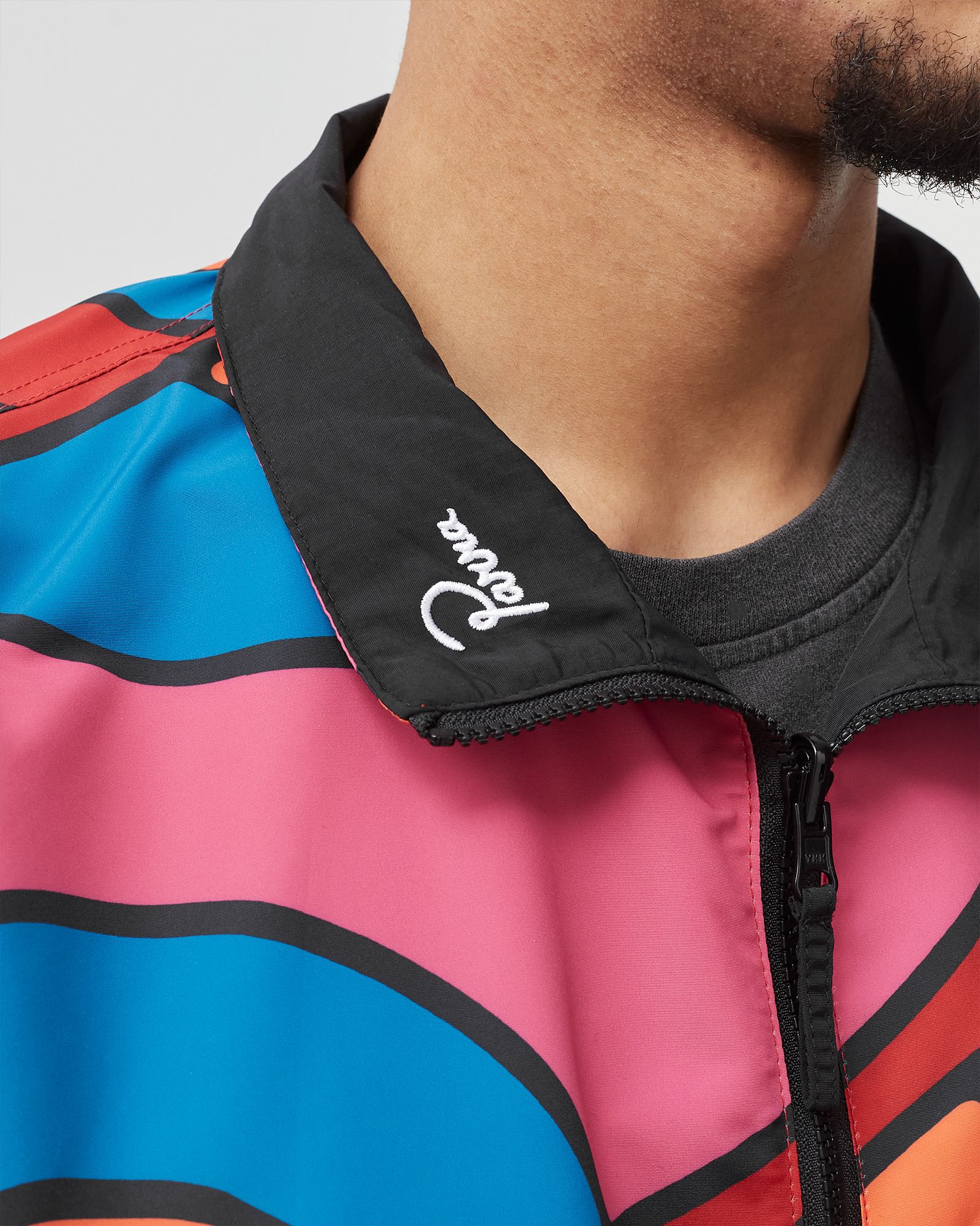 serpent pattern track top