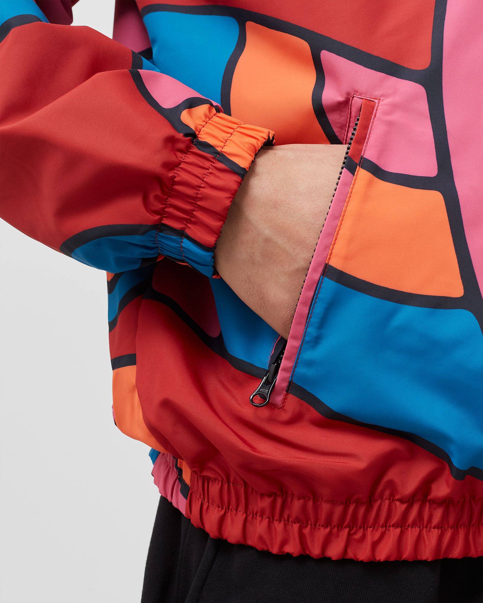 serpent pattern track top