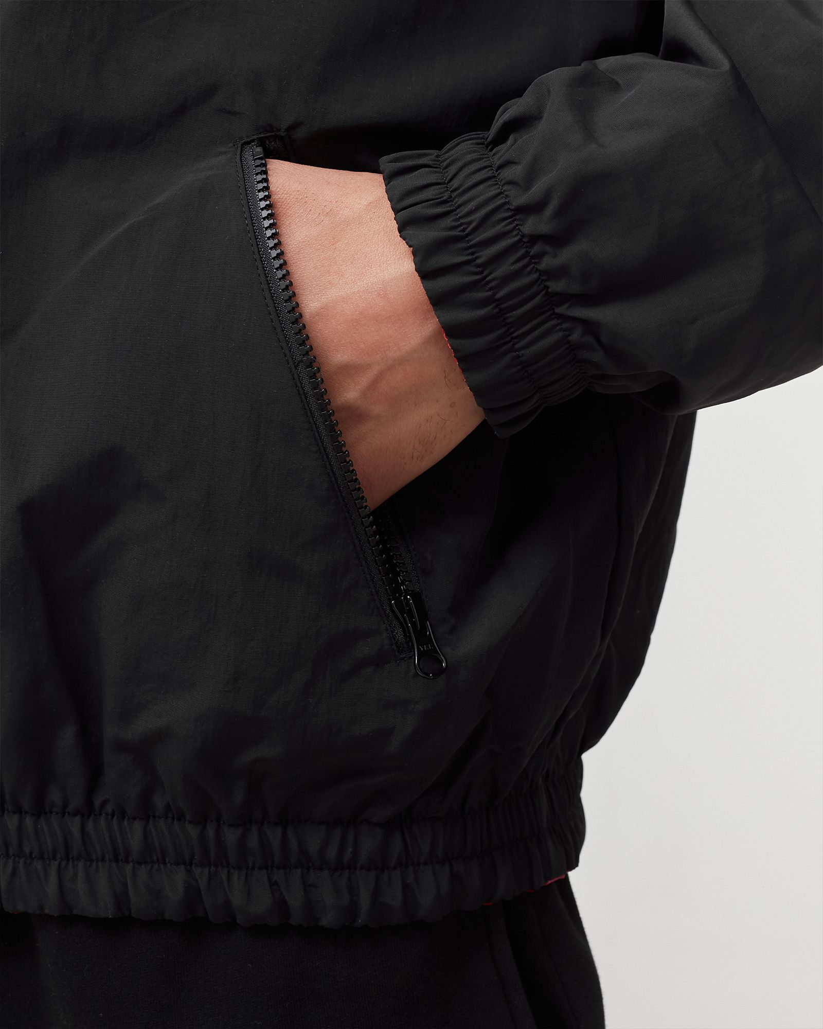 serpent pattern track top