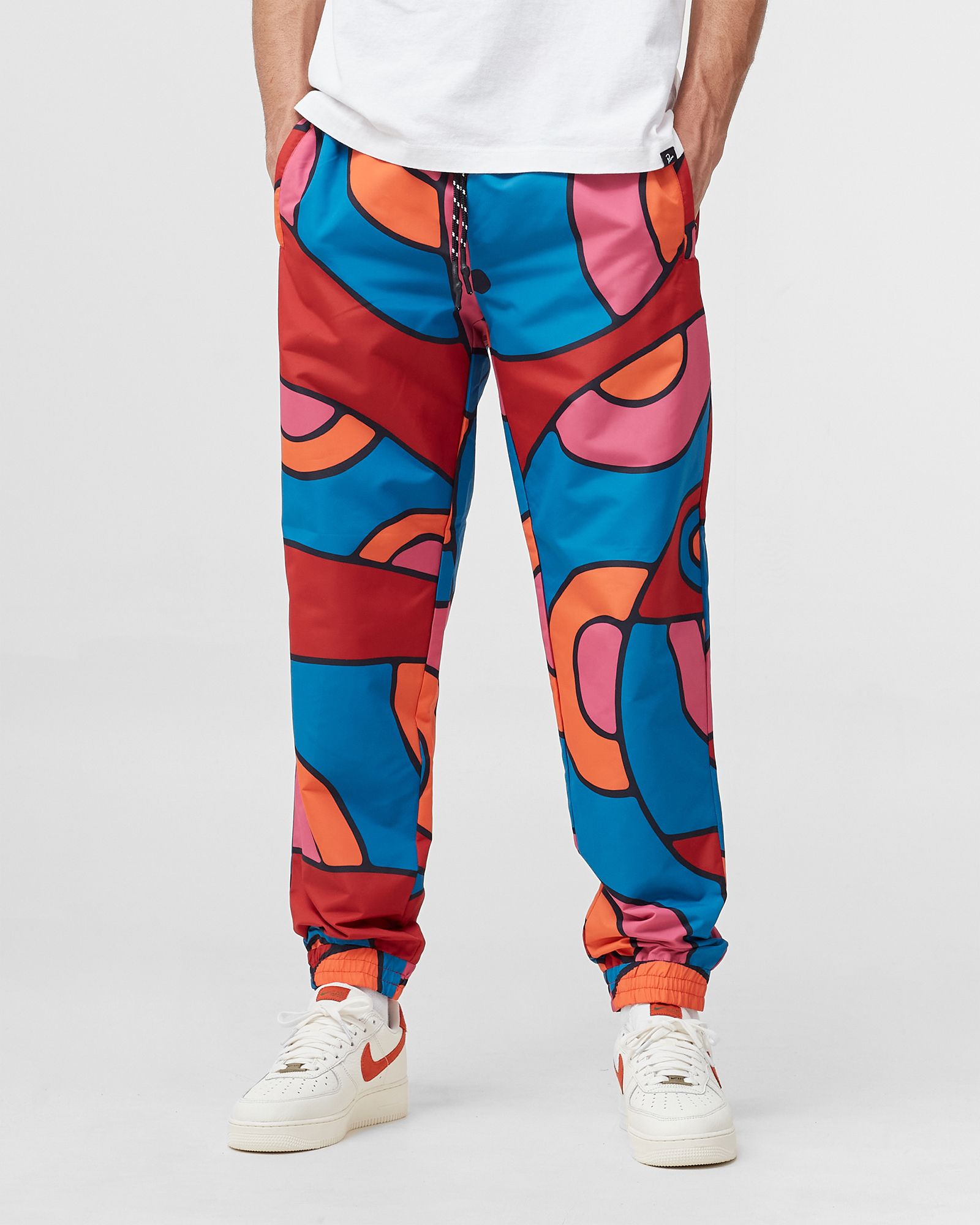 serpent pattern track pants
