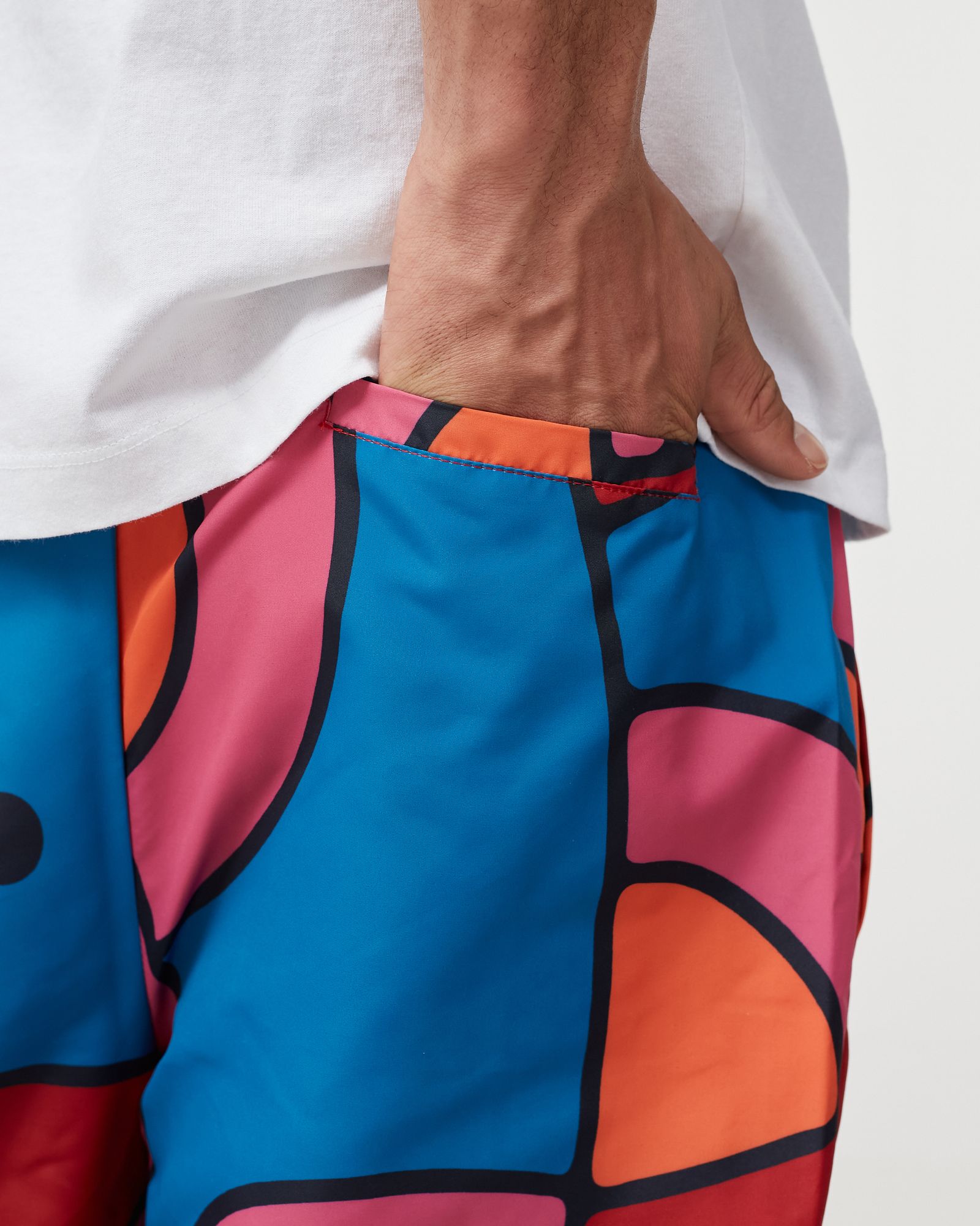 serpent pattern track pants