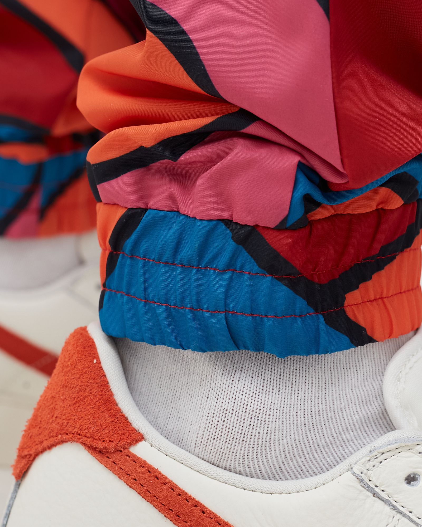 serpent pattern track pants