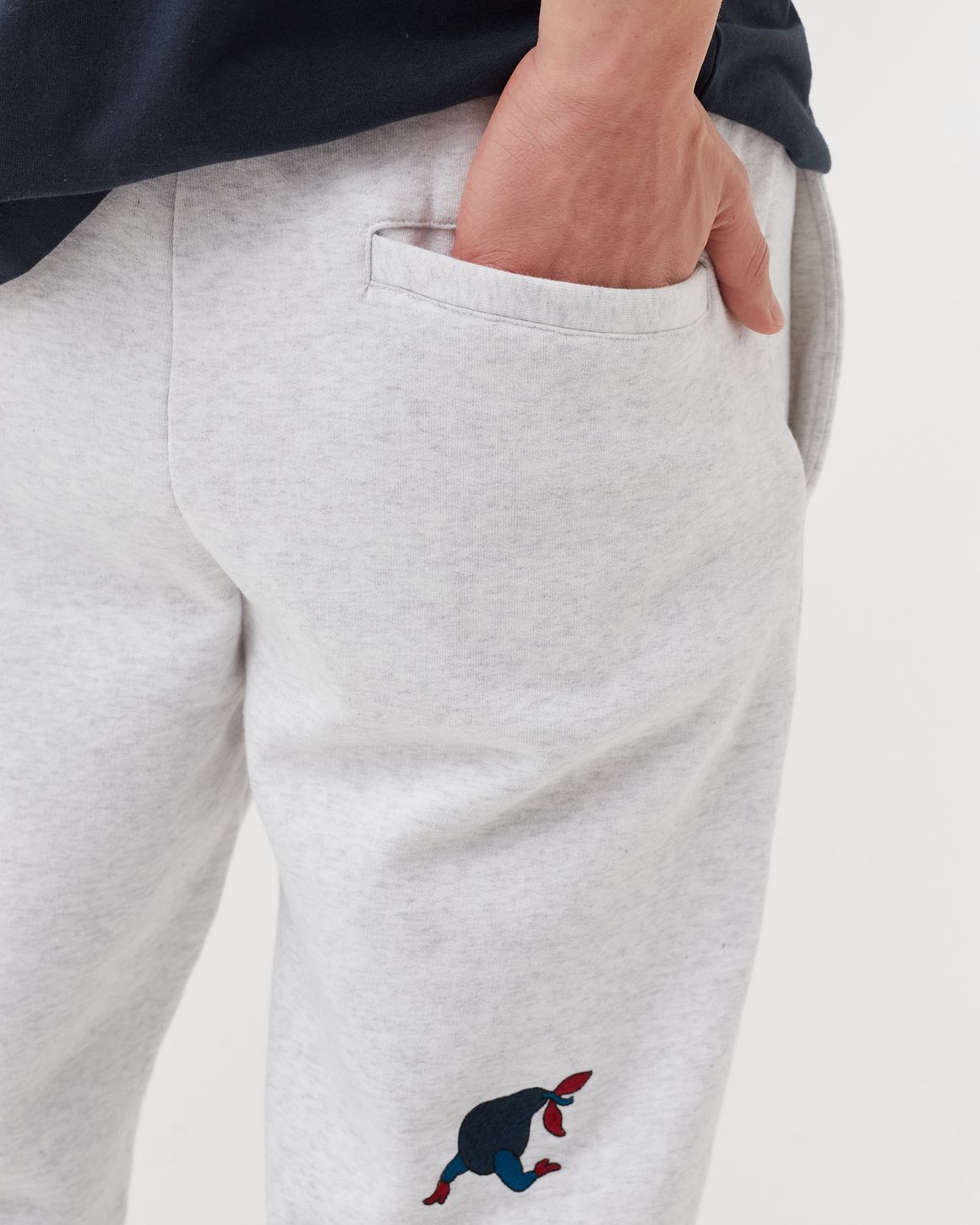 By Parra RUNNING PEAR SWEATPANTS Grey | BSTN Store