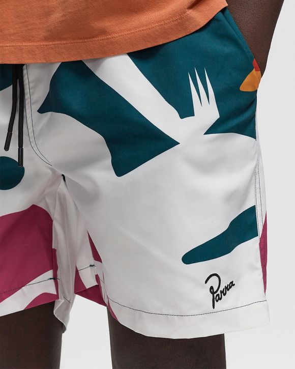 beached in swim shorts