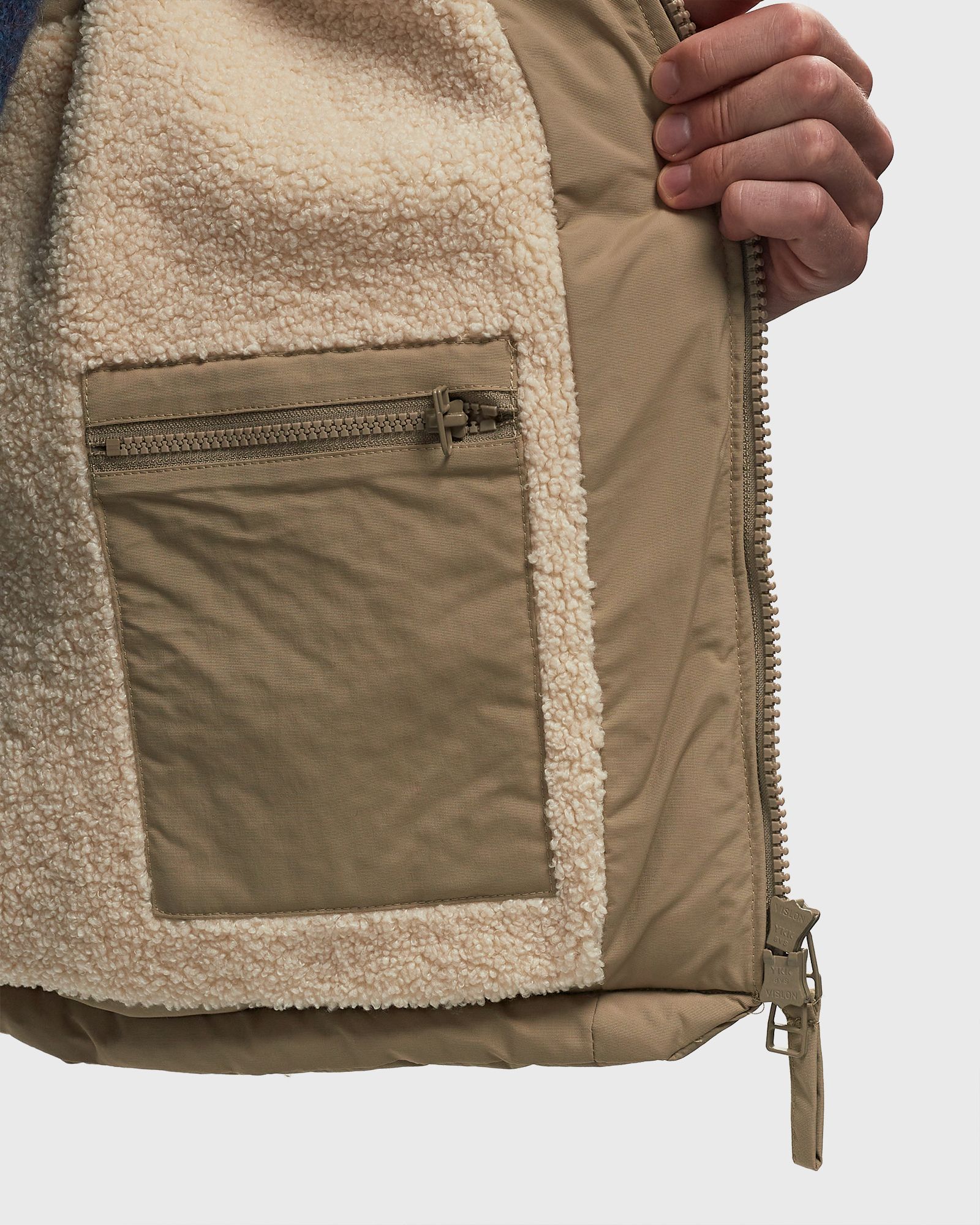 waved alien puffer vest