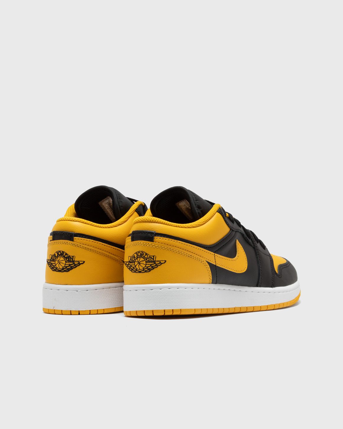 Black and yellow high top jordans on sale