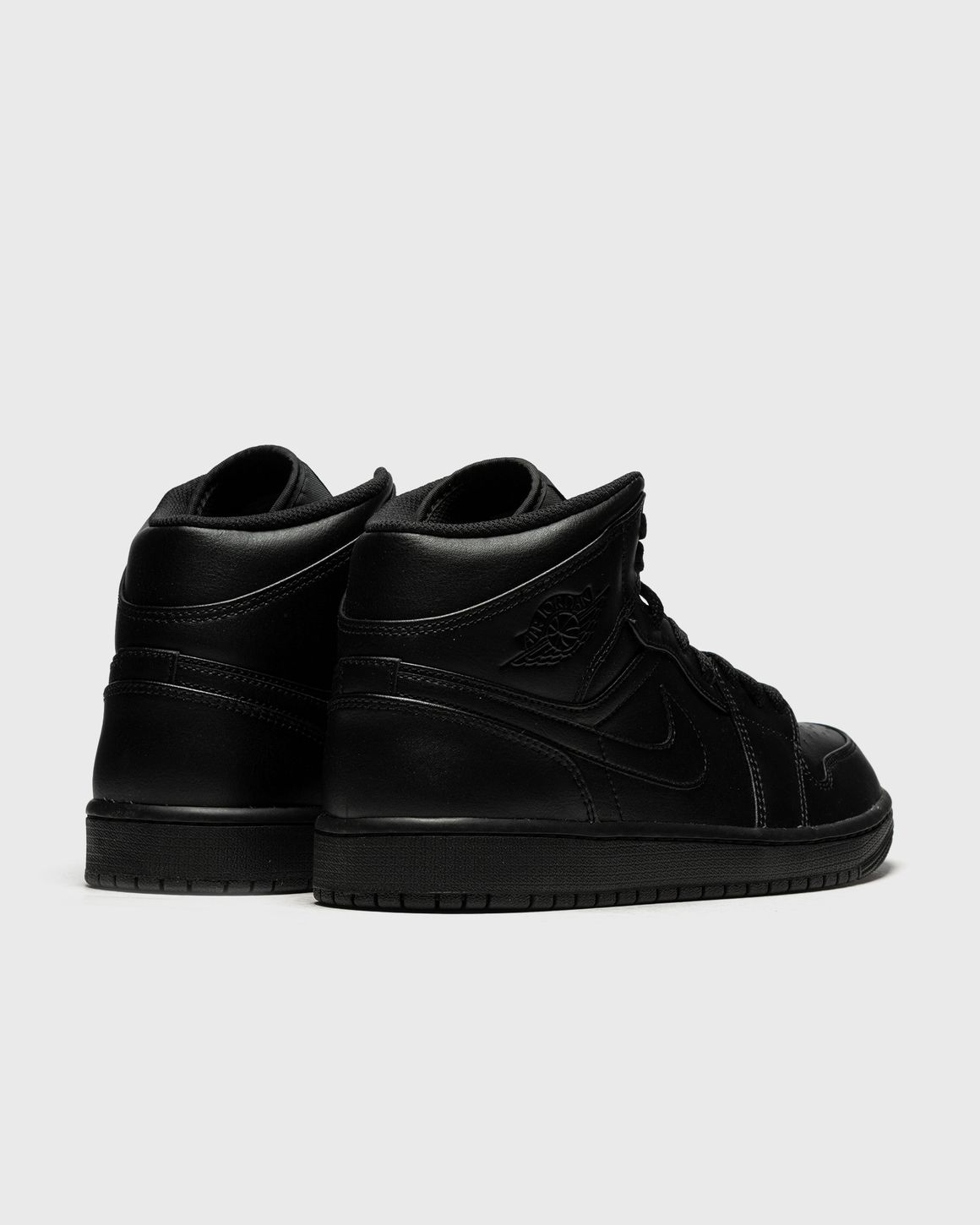 Black jordan aj 1 mid online