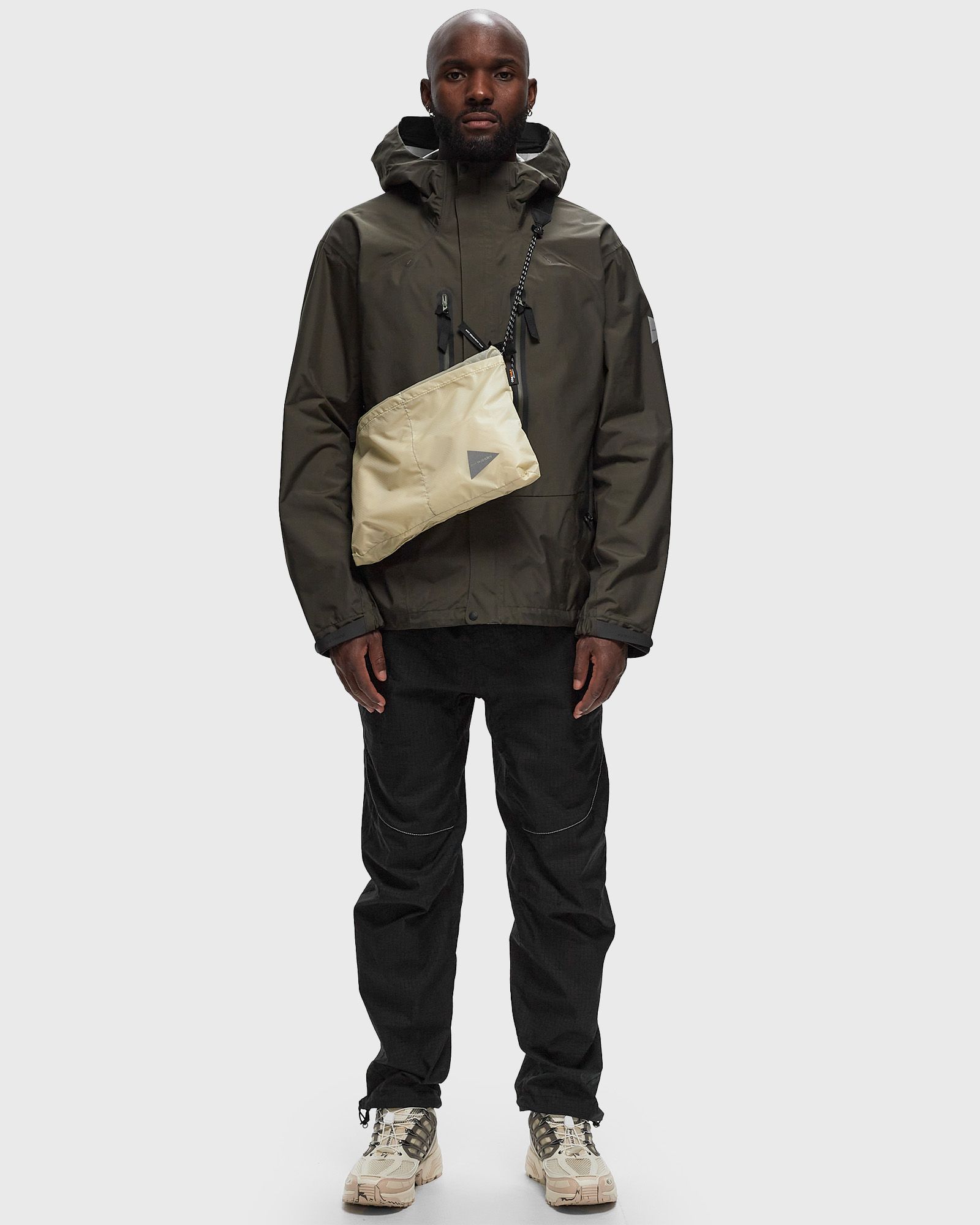 And Wander 2.5L HIKER RAIN JACKET Brown | BSTN Store