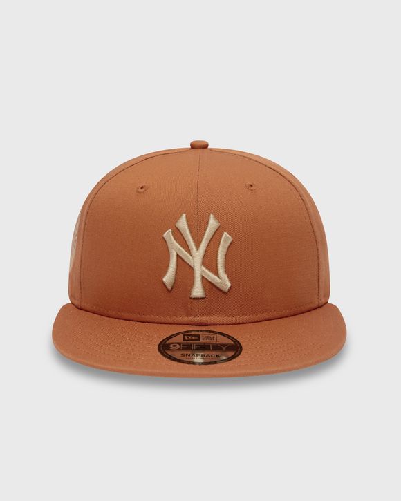 New Era 9fifty NY cap in white with orange logo