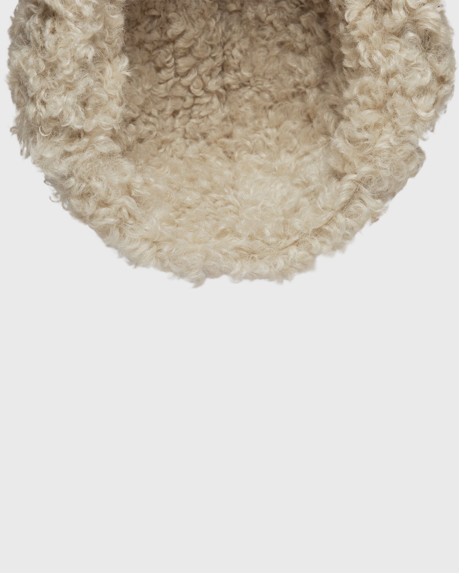 IMG LODEN TRAPPER NEWERA