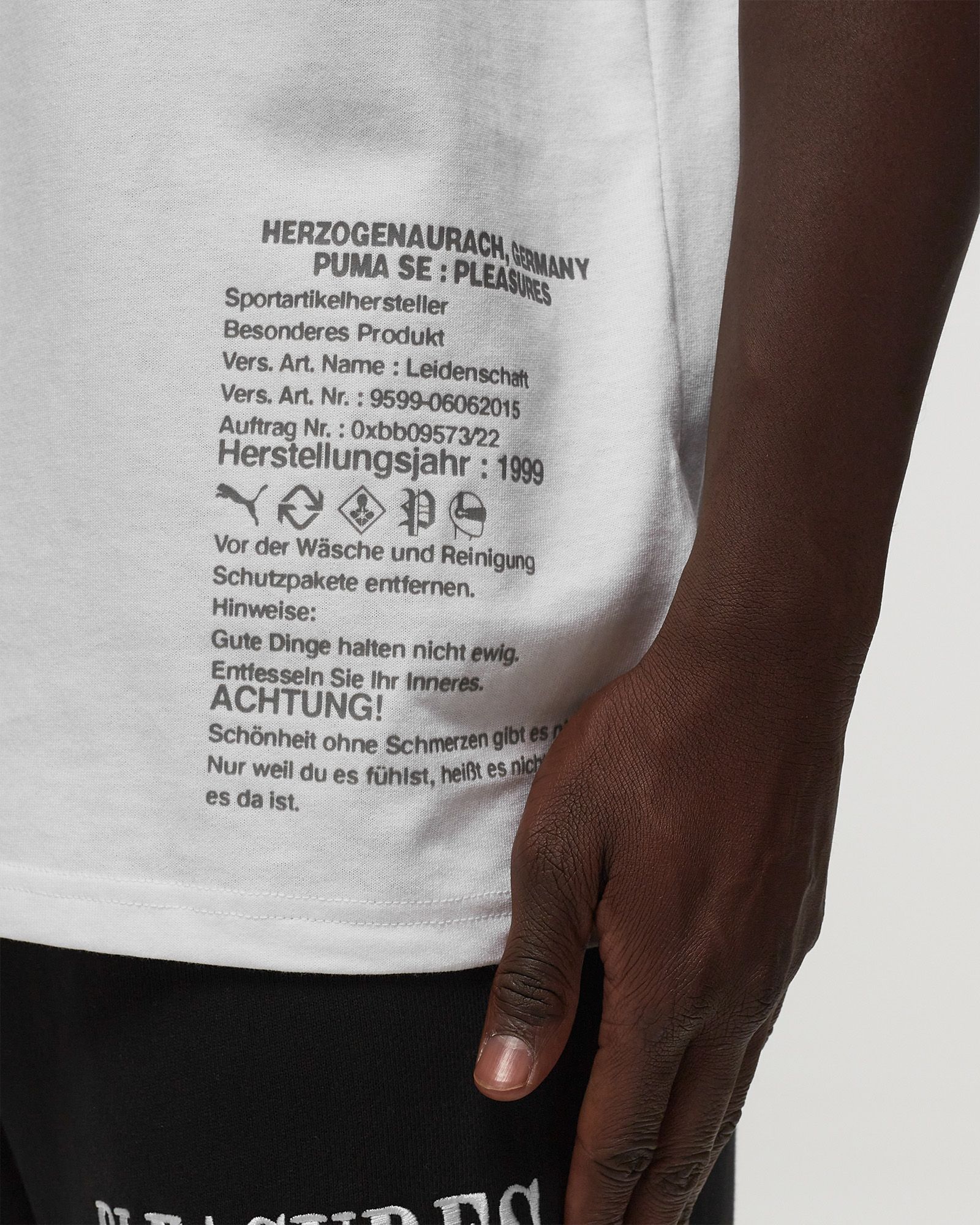 PUMA x PLEASURES Typo Tee