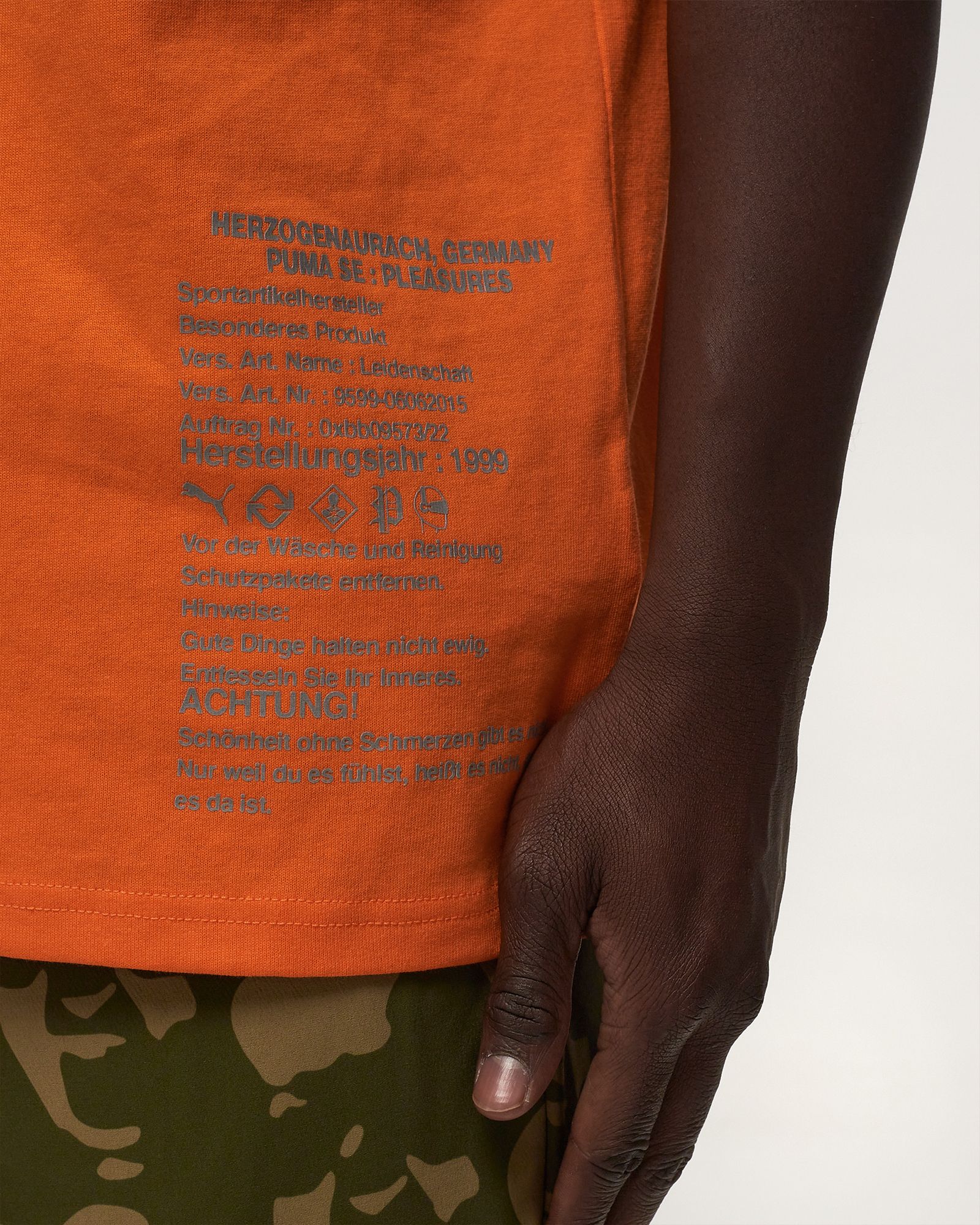 PUMA x PLEASURES Typo Tee