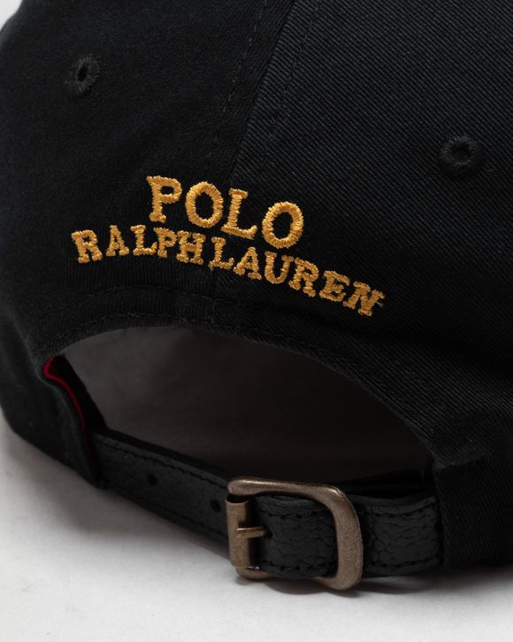 Black polo cap with cheap leather strap