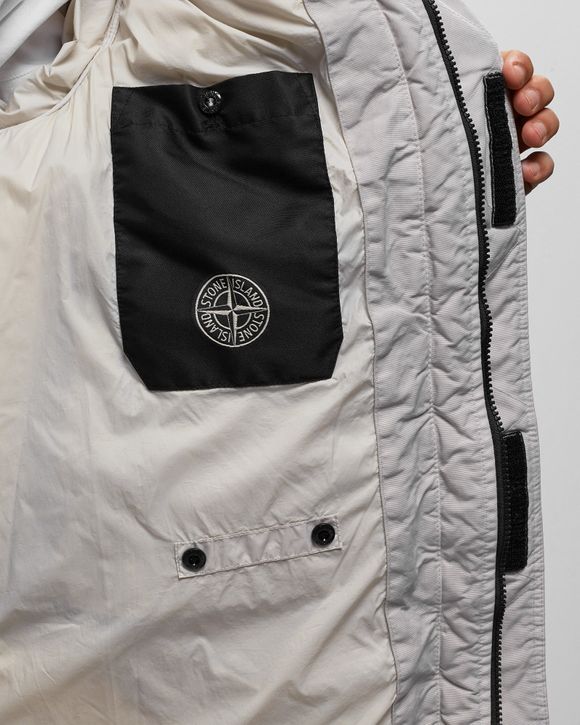 Stone island white badge on sale jacket