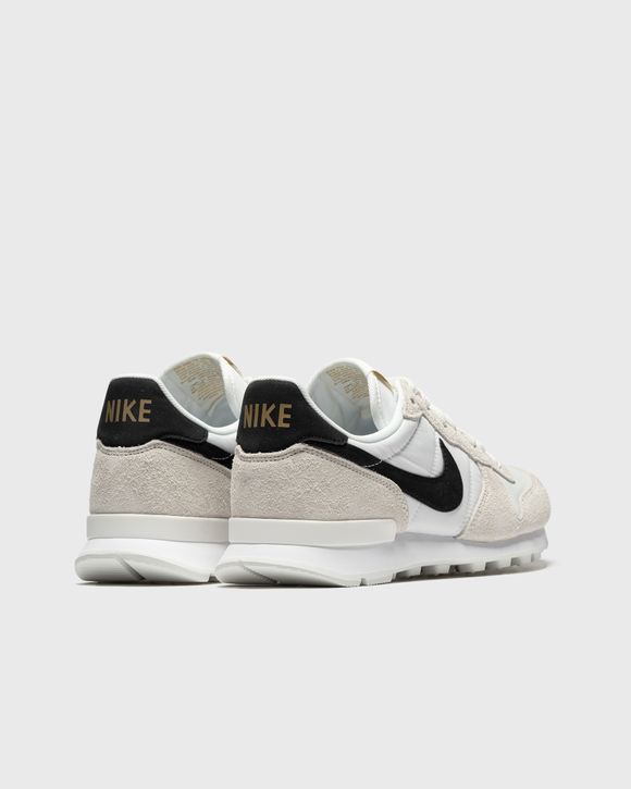 Nike internationalist store white gold