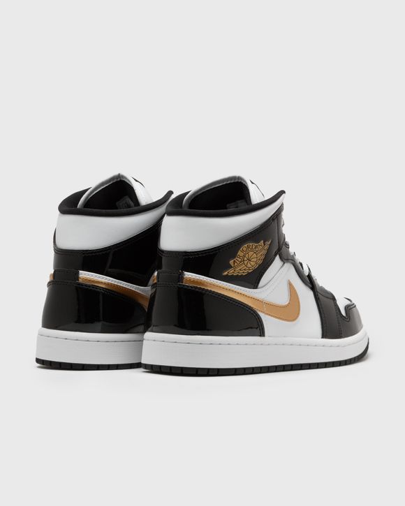 Jordan 1 nere e oro sale