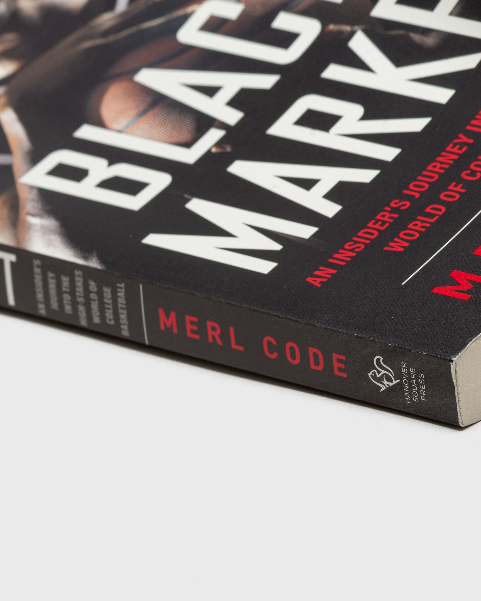 "Black Market - An Insider's Journey Into the High-Stakes World of College Basketball" by Merl Code