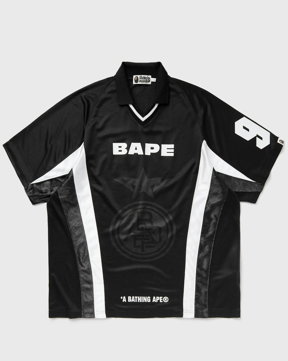 A Bathing Ape MULTI LOGO RELAXED FIT SOCCER JERSEY Black | BSTN Store