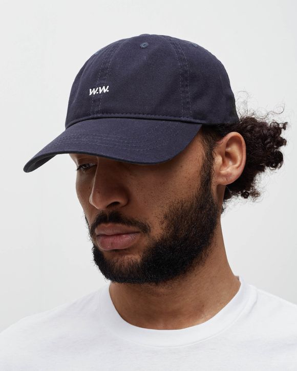 Low store profile cap