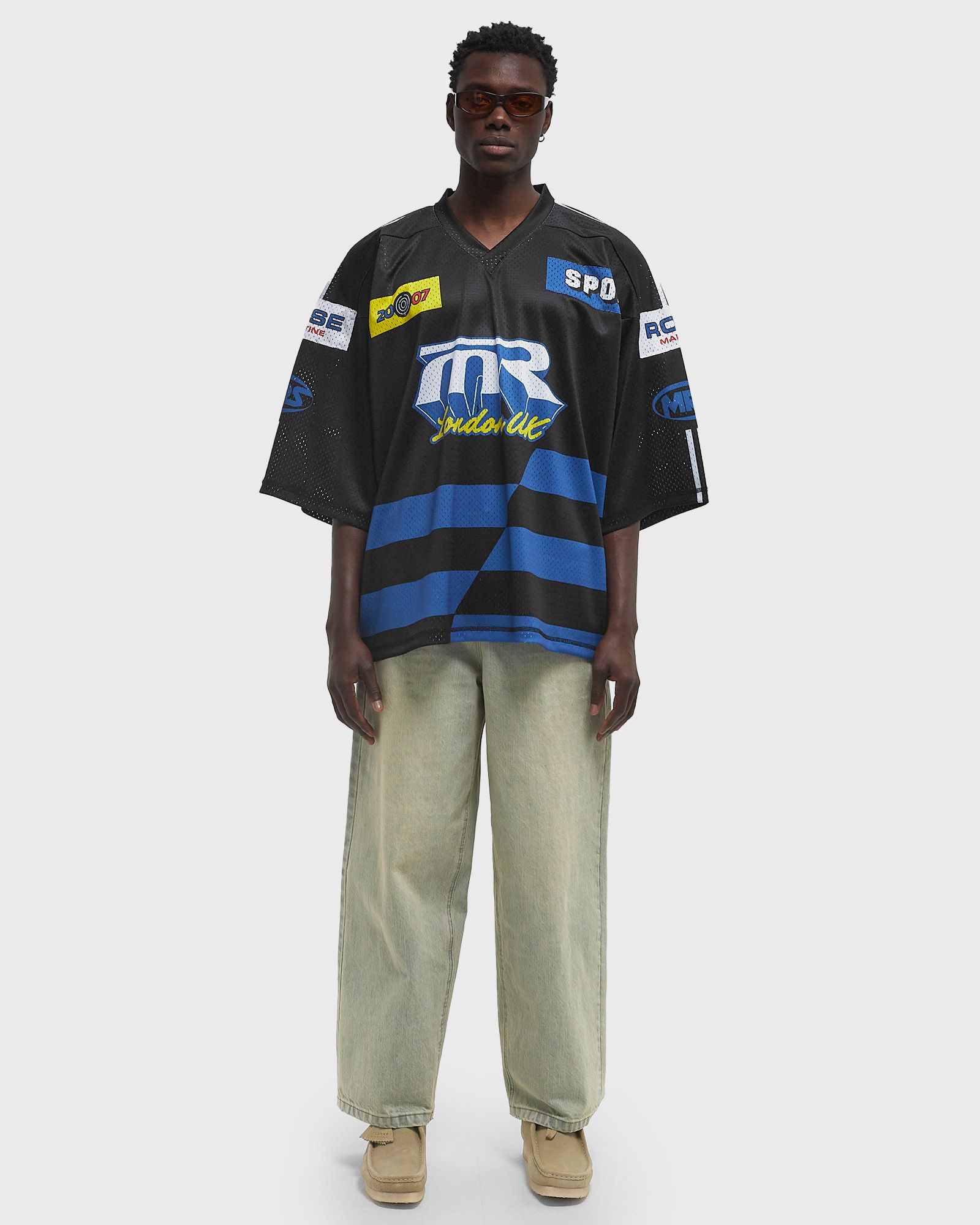 Martine Rose OVERSIZED FOOTBALL TOP Black | BSTN Store