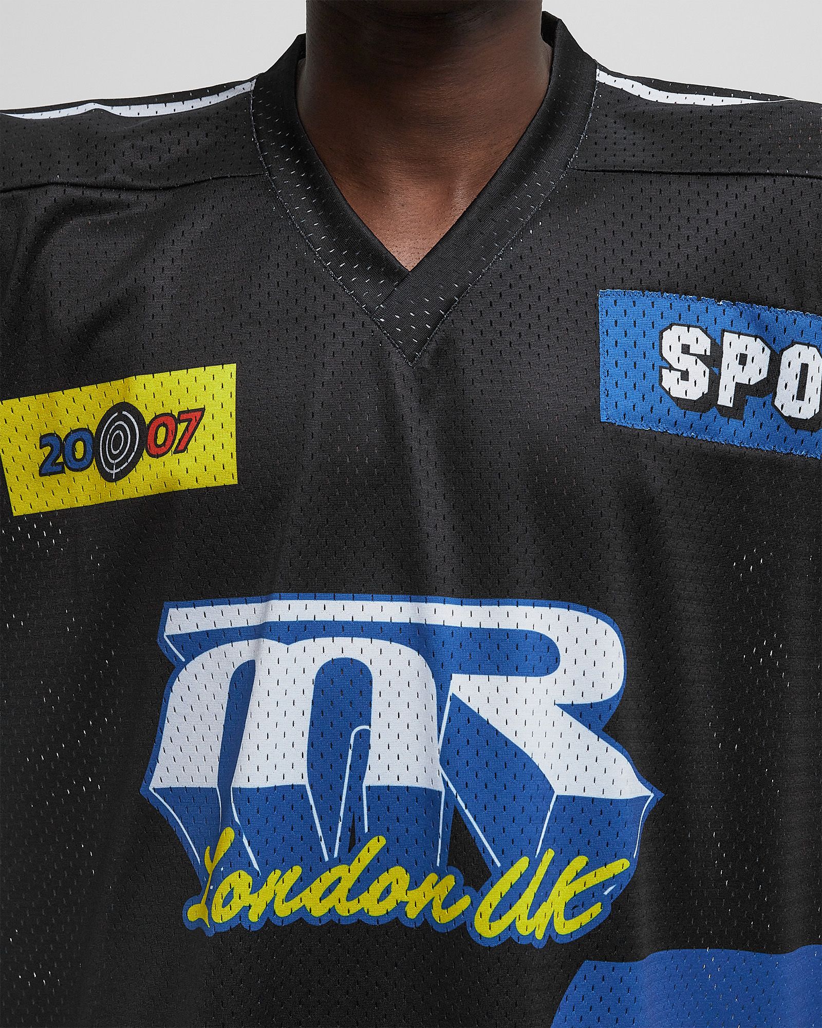 OVERSIZED FOOTBALL TOP