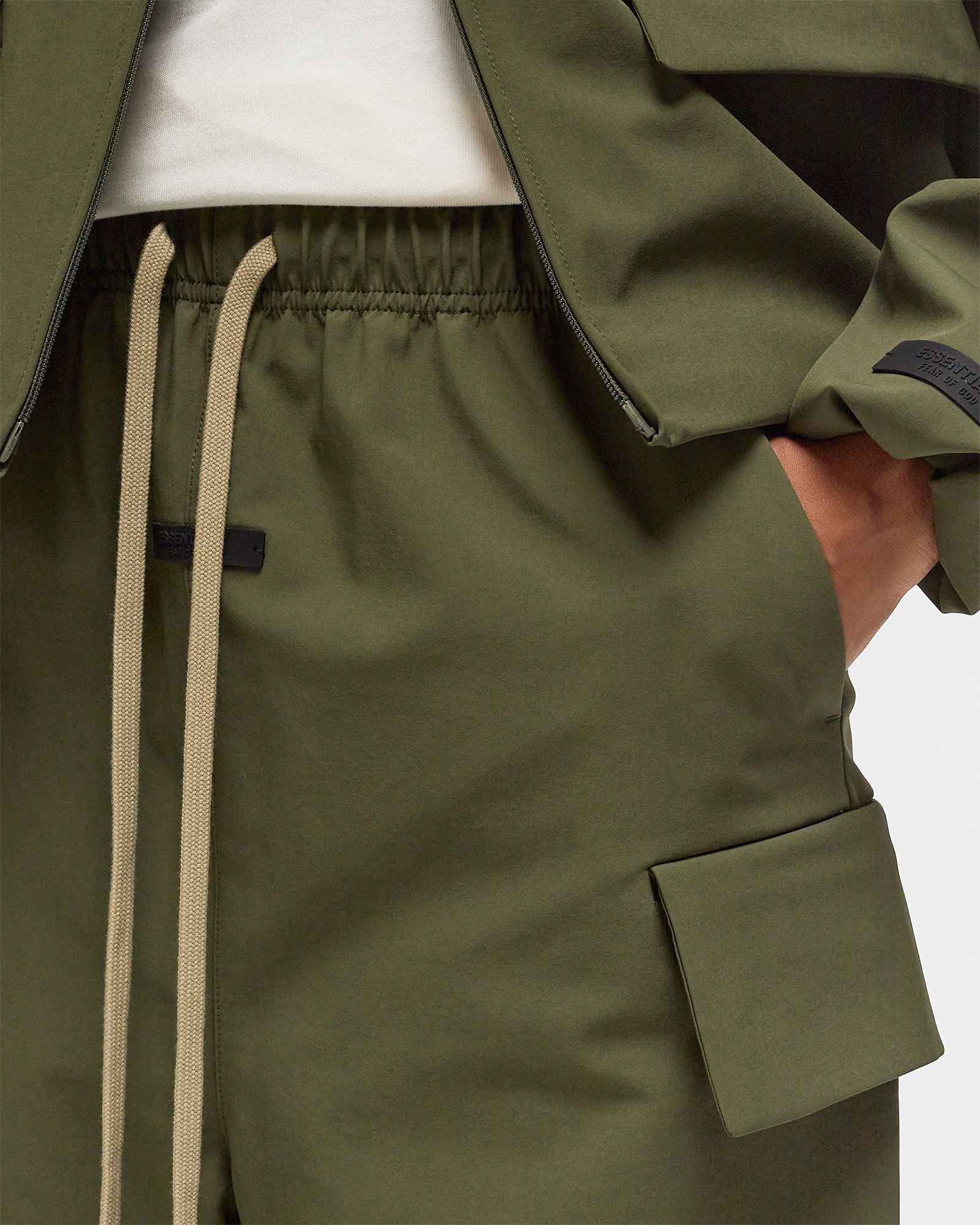 Fear of God Essentials BONDED NYLON FIELD PANT Green | BSTN