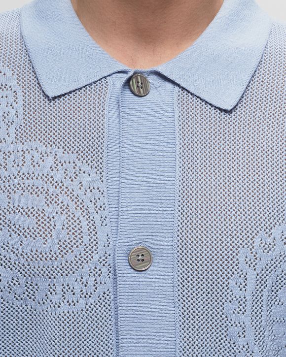 Tear drop open knit shirt