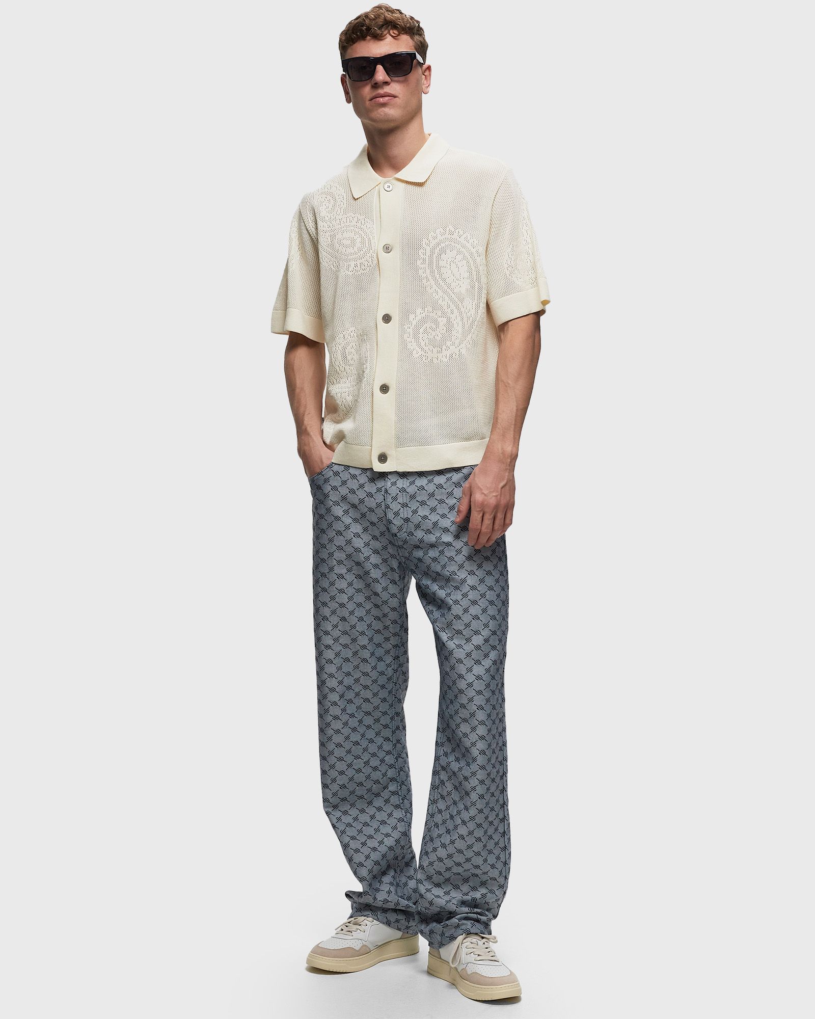 Tear drop open knit shirt