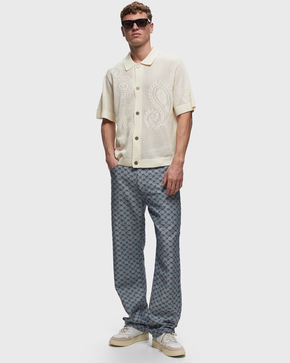 Tear drop open knit shirt