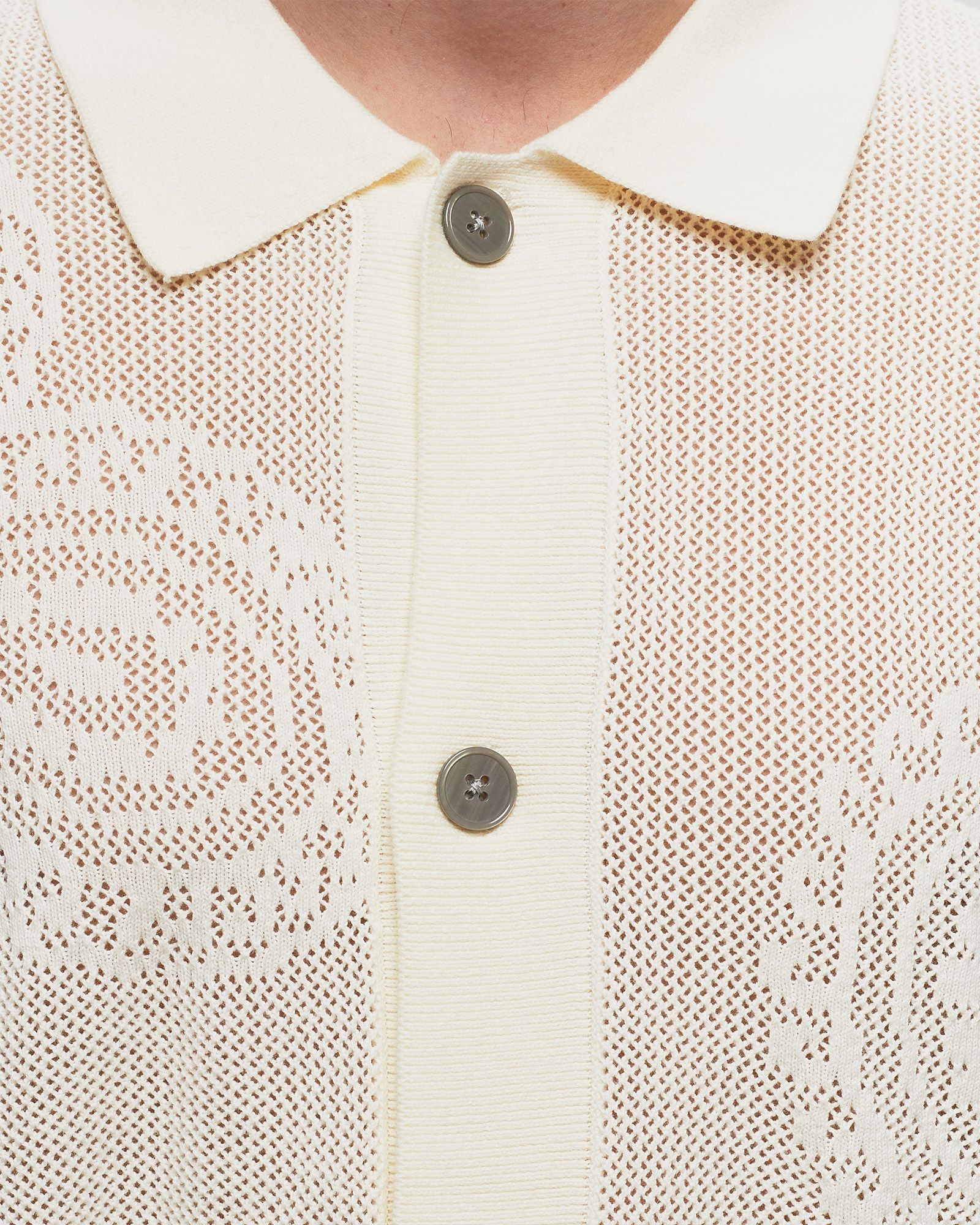 Tear drop open knit shirt