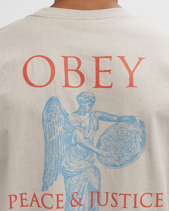 Obey peace & justice statue