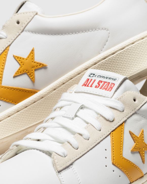 Converse white hot sale gold leather