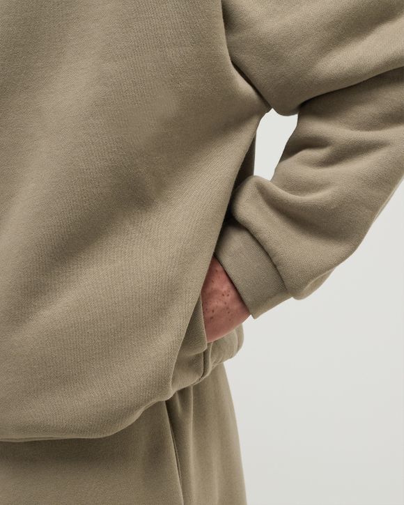 FEAR OF GOD フィアオブゴッド パーカー ベージュ 3360425Y0002 Fear of God Essentials FLEECE HOODIE Beige | BSTN Store