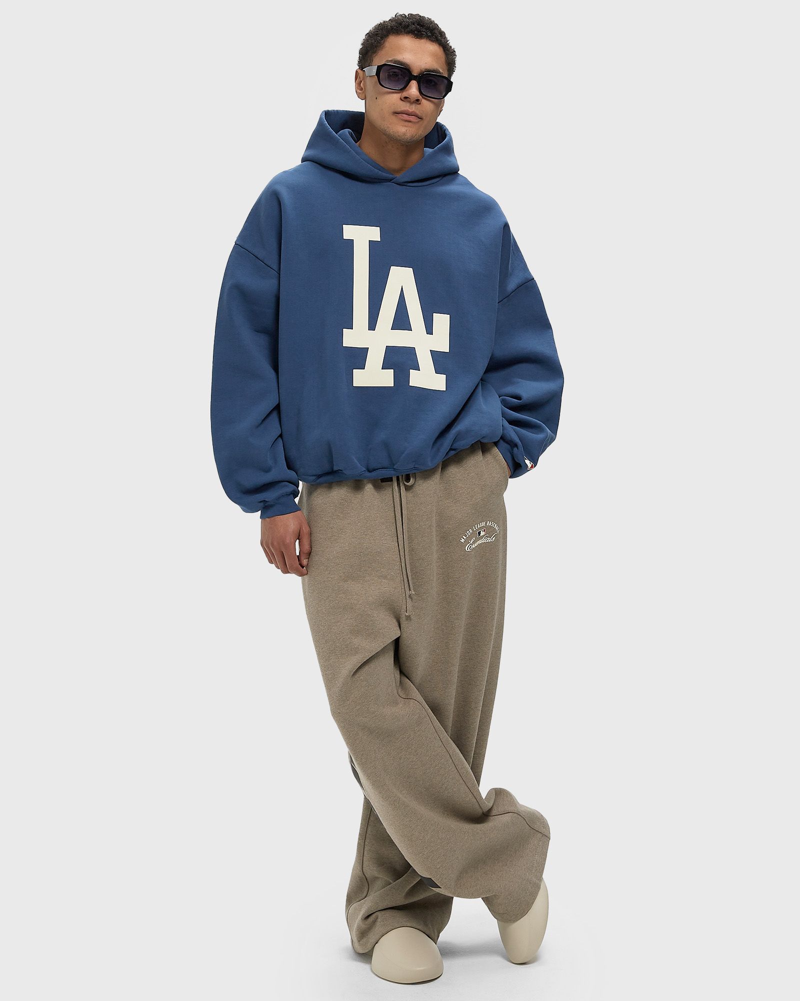 Fear of God Essentials DODGERS SPORT HOODIE Blue | BSTN Store