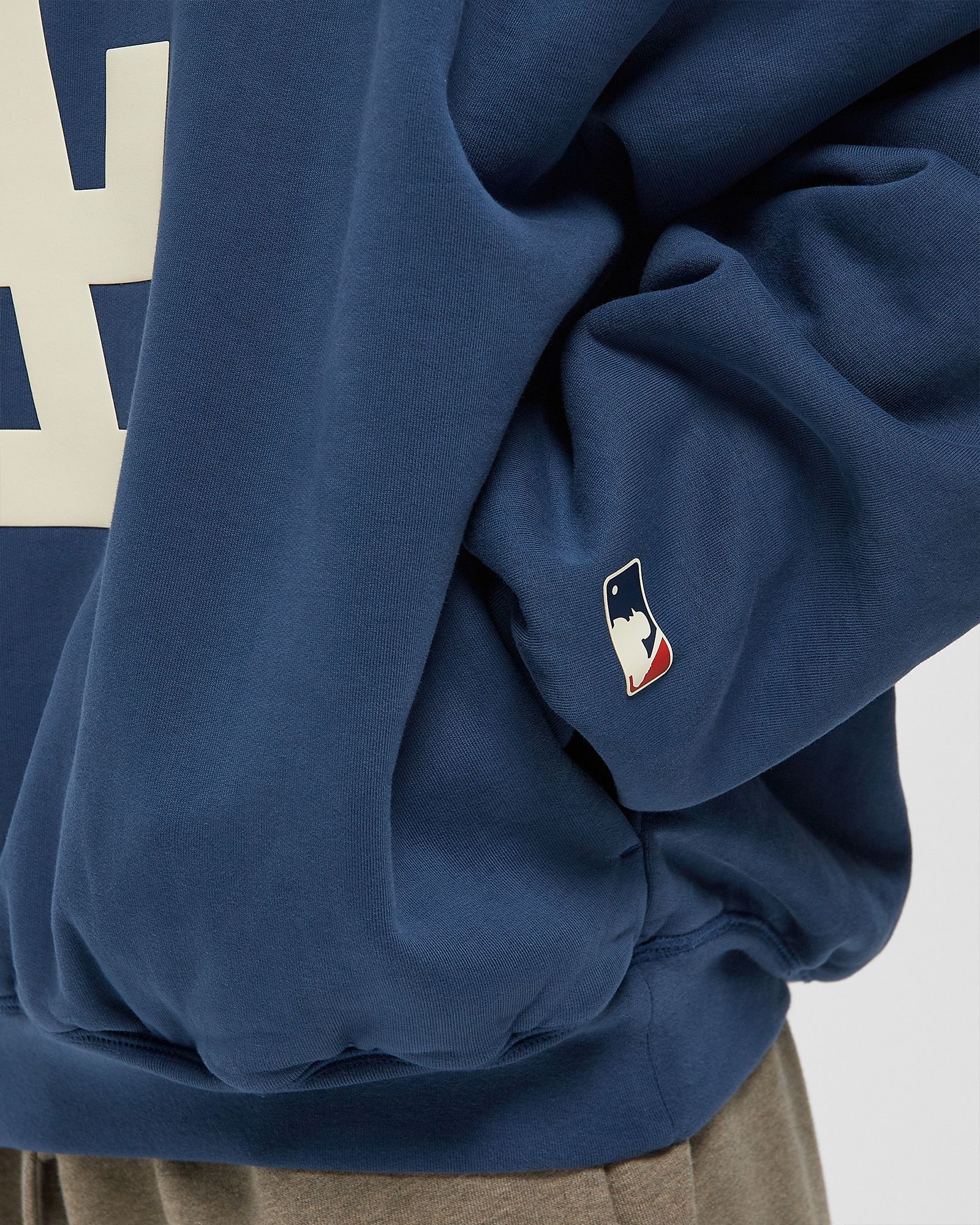 Fear of God Essentials DODGERS SPORT HOODIE Blue | BSTN Store