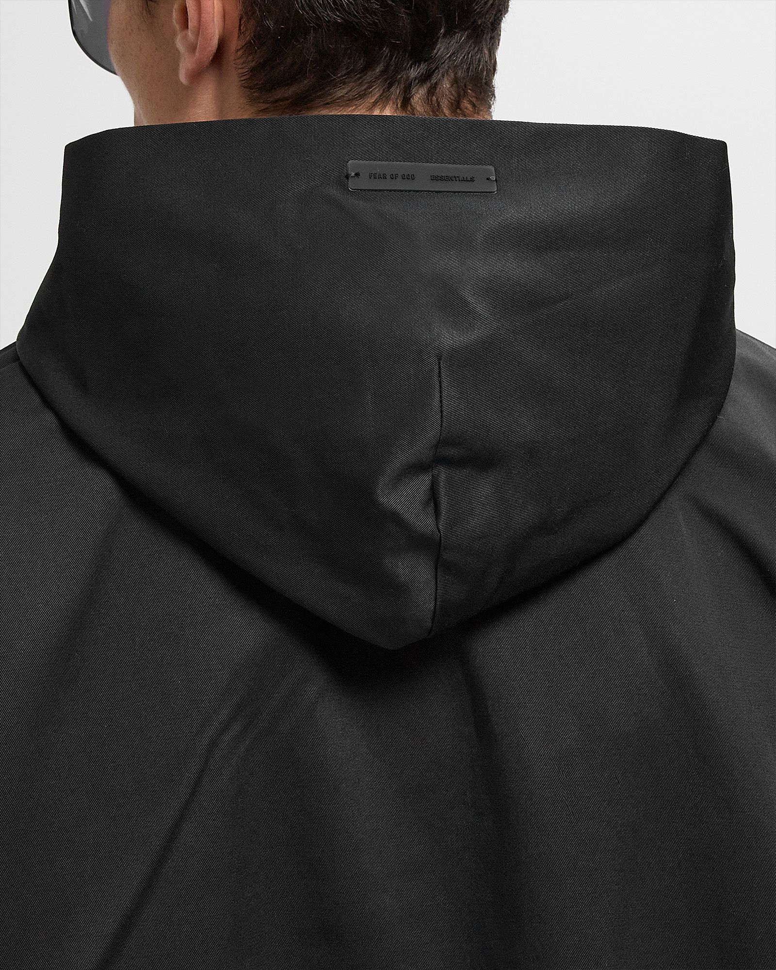 Fear of God Essentials POLY COTTON TWILL HOODIE Black | BSTN