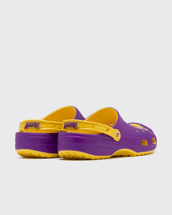 Purple and store yellow crocs