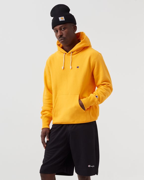 CHAMPION REVERSE HOODIE Yellow BSTN